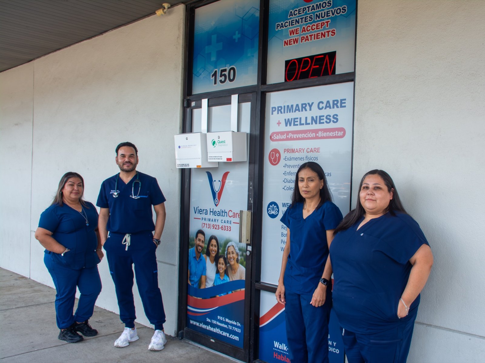 Viera HealthCare Primary Care team outside the Houston clinic entrance